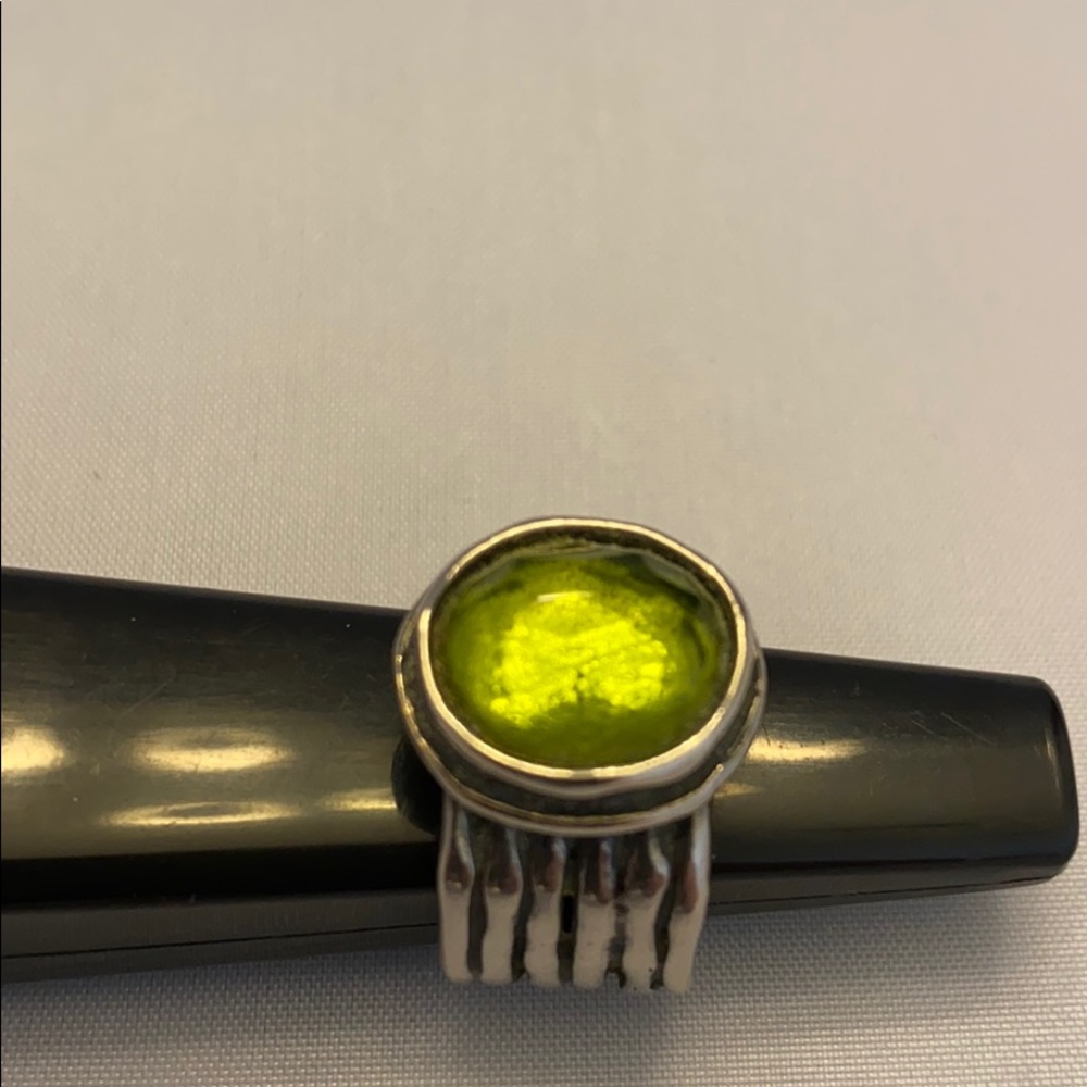 Peridot and silver ring